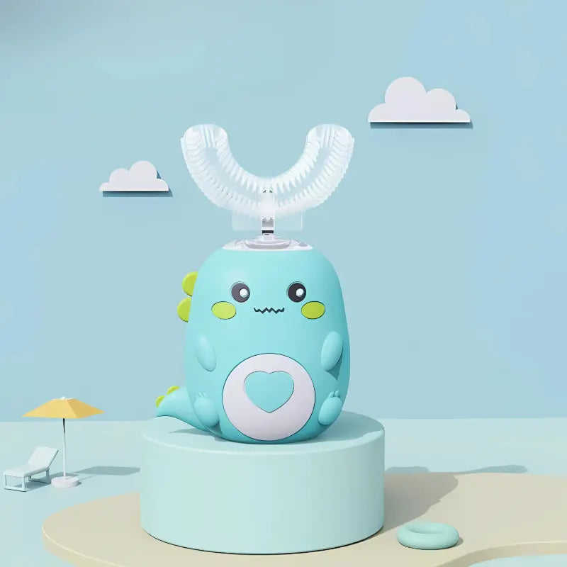 Cute green dinosaur-shaped kids electric U-shaped toothbrush on a light green background with small clouds and a beach umbrella.